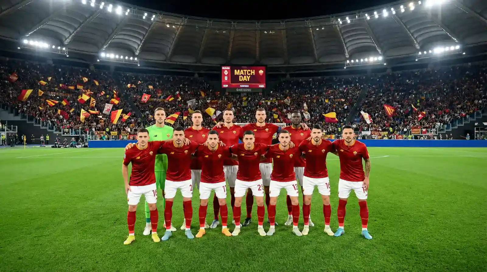 Équipe nationale de football sur le terrain en formation avant un match